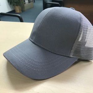 C.C. Trucker hat with ponytail/messy bun- gray